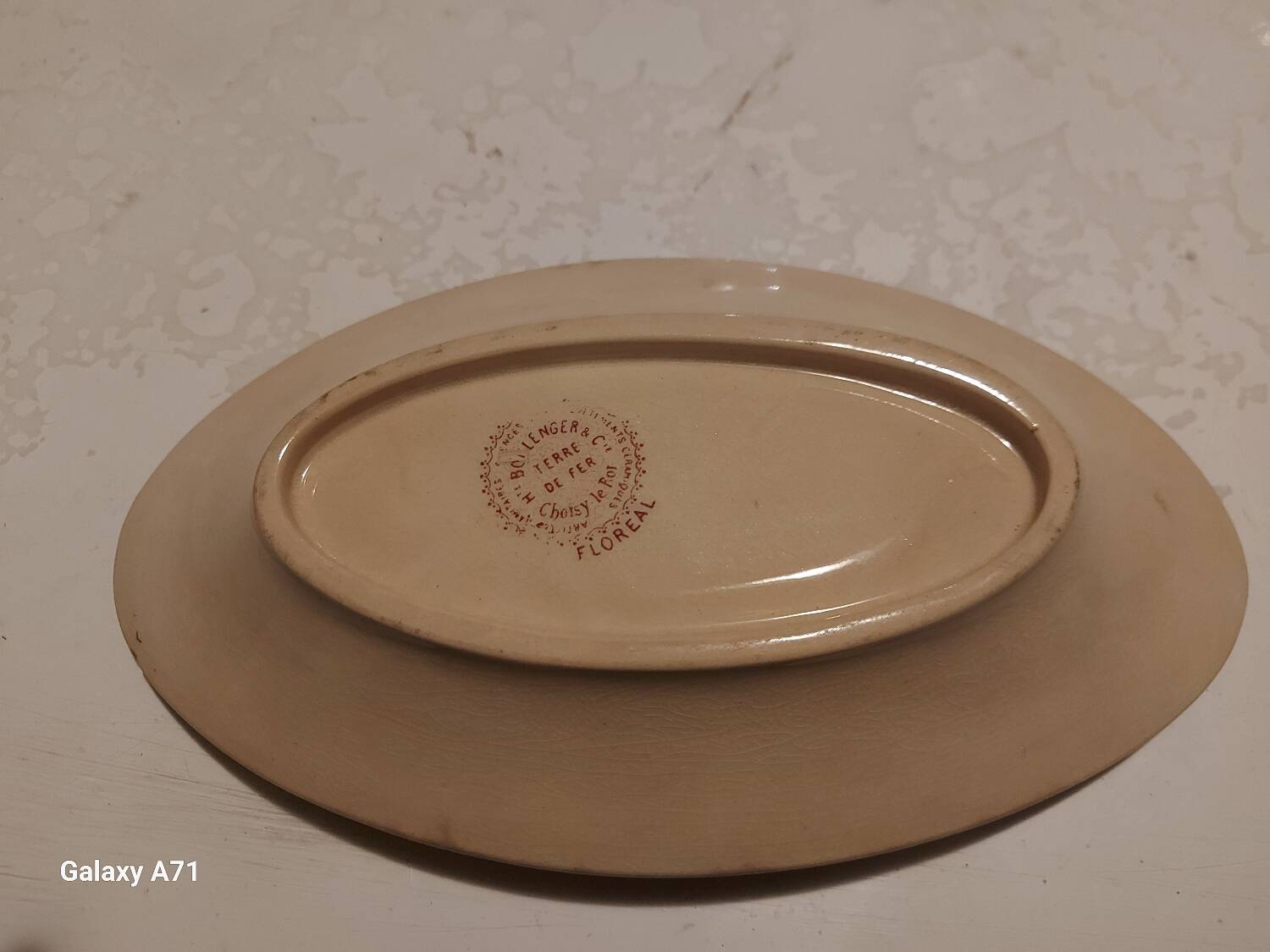 Old iron earthenware dish from Choisy le Roy