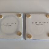A set of two undersides of flat