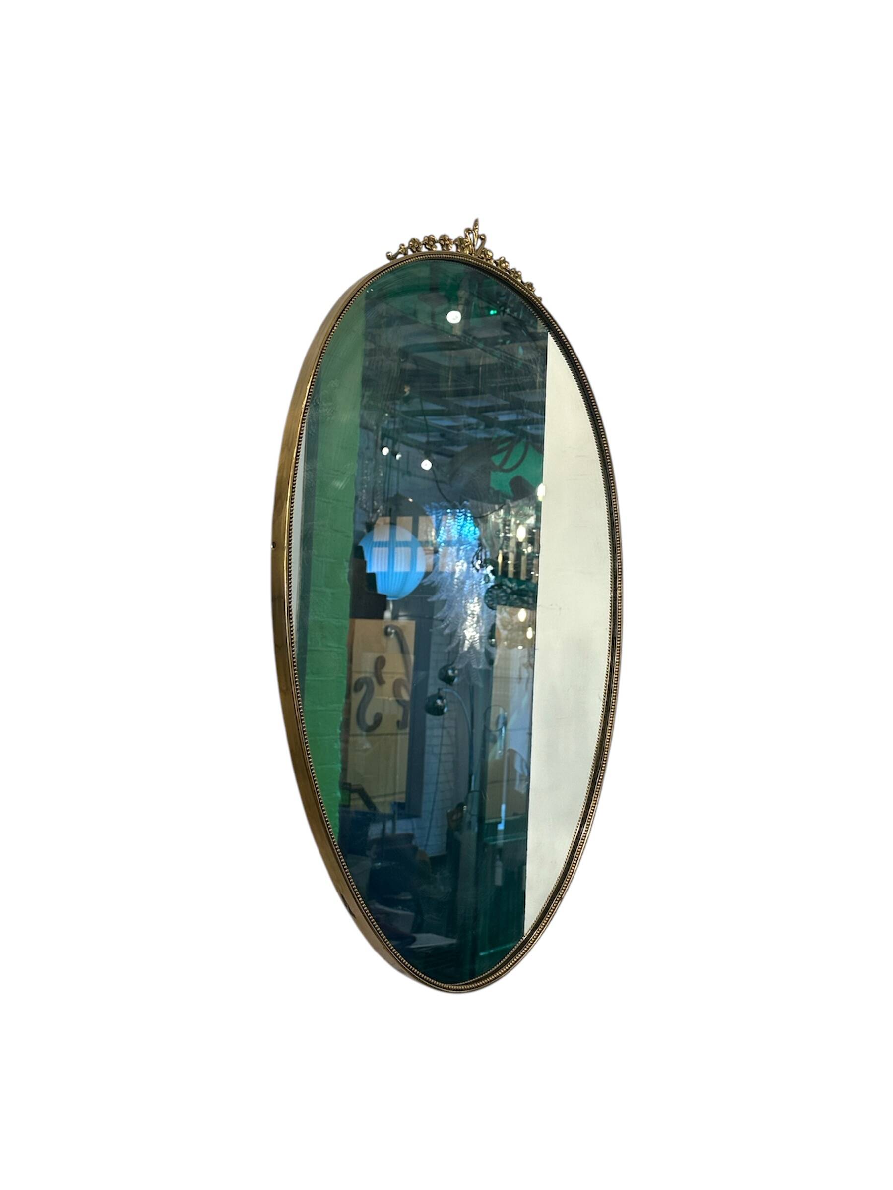 Italian 1940-50’s brass frame mirror.