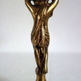 Pair of cherub candle holders in gilded bronze, early 20th century.