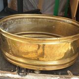 Oval brass planter with large handle