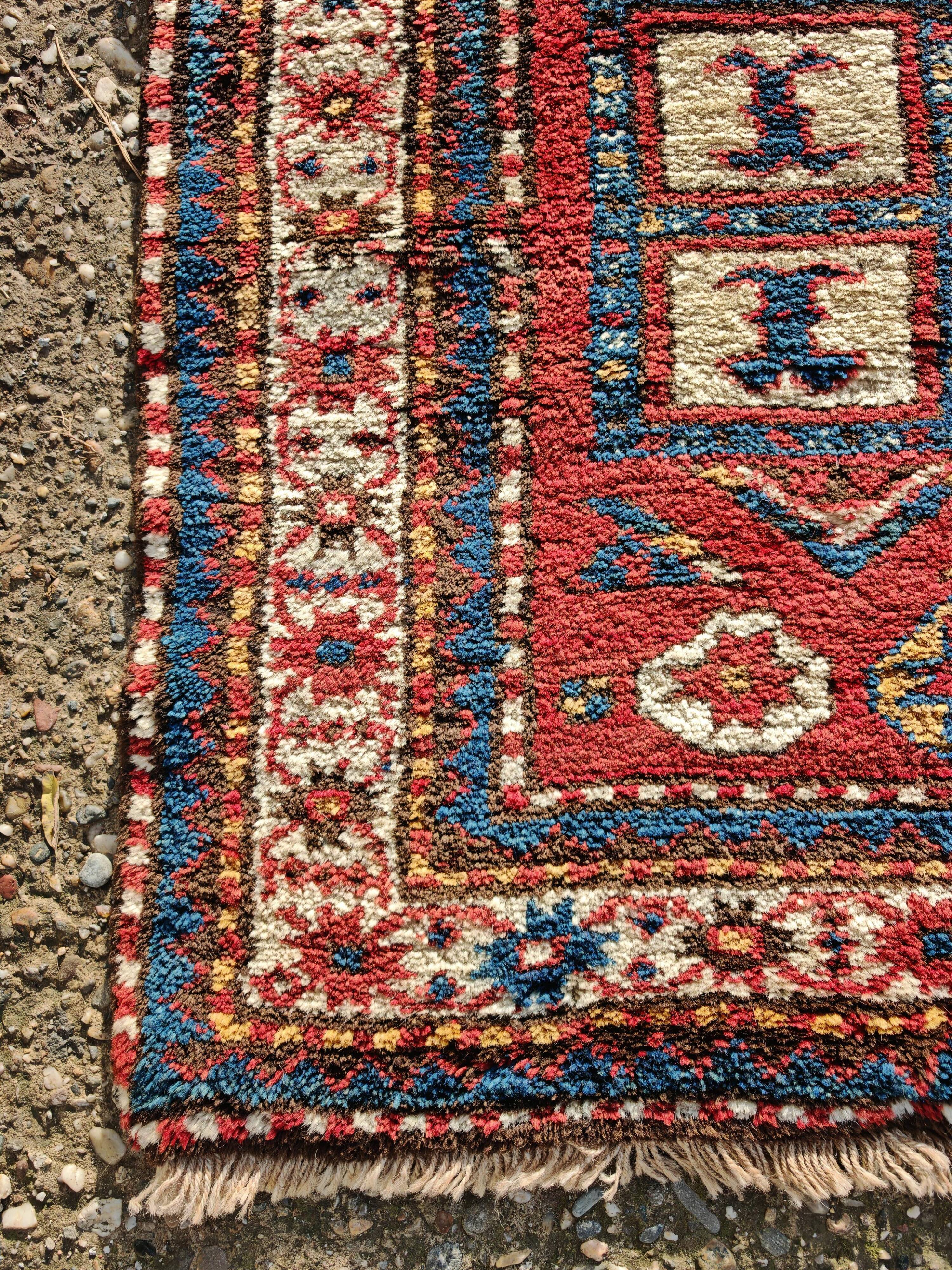 Antique Caucasian Karabakh carpet in 100% wool, late 19th century.