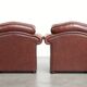 Vintage set of 2 cowhide leather Chesterfield armchairs in a brown colour