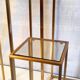 Pull-out harnesses in gilded brass and smoked glass.