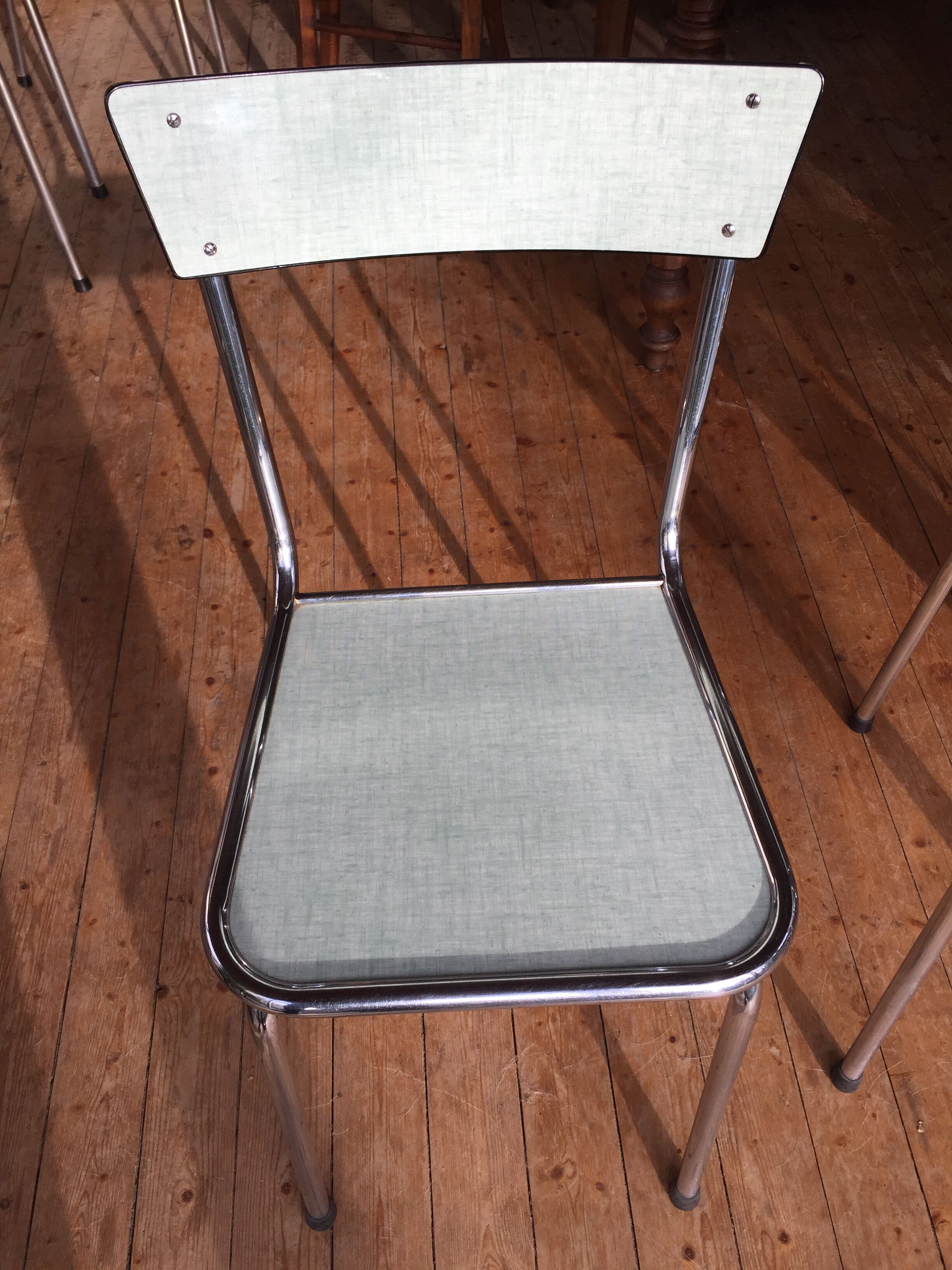 Green formica chairs