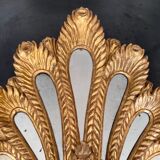 Palm-shaped faceted mirror