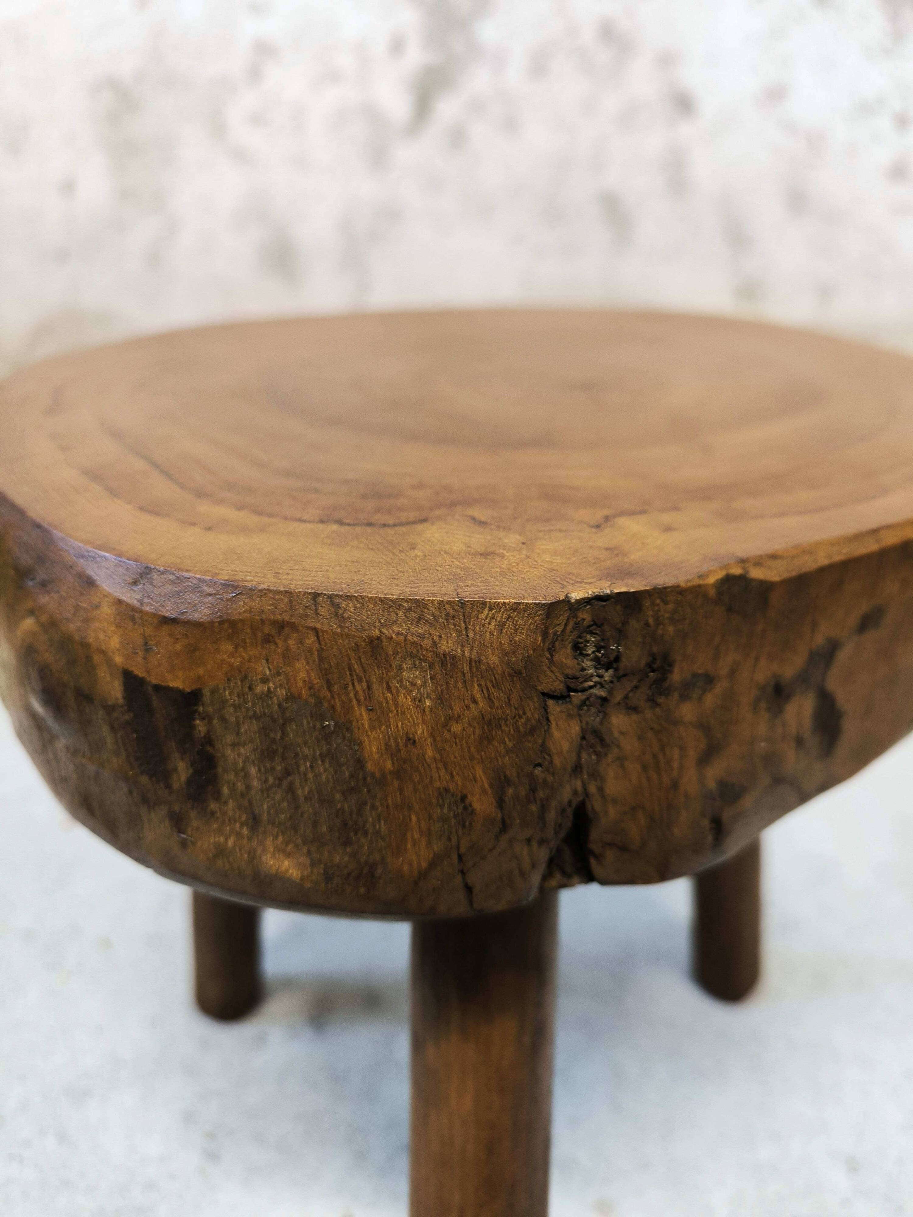 Vintage wooden tripod stool.