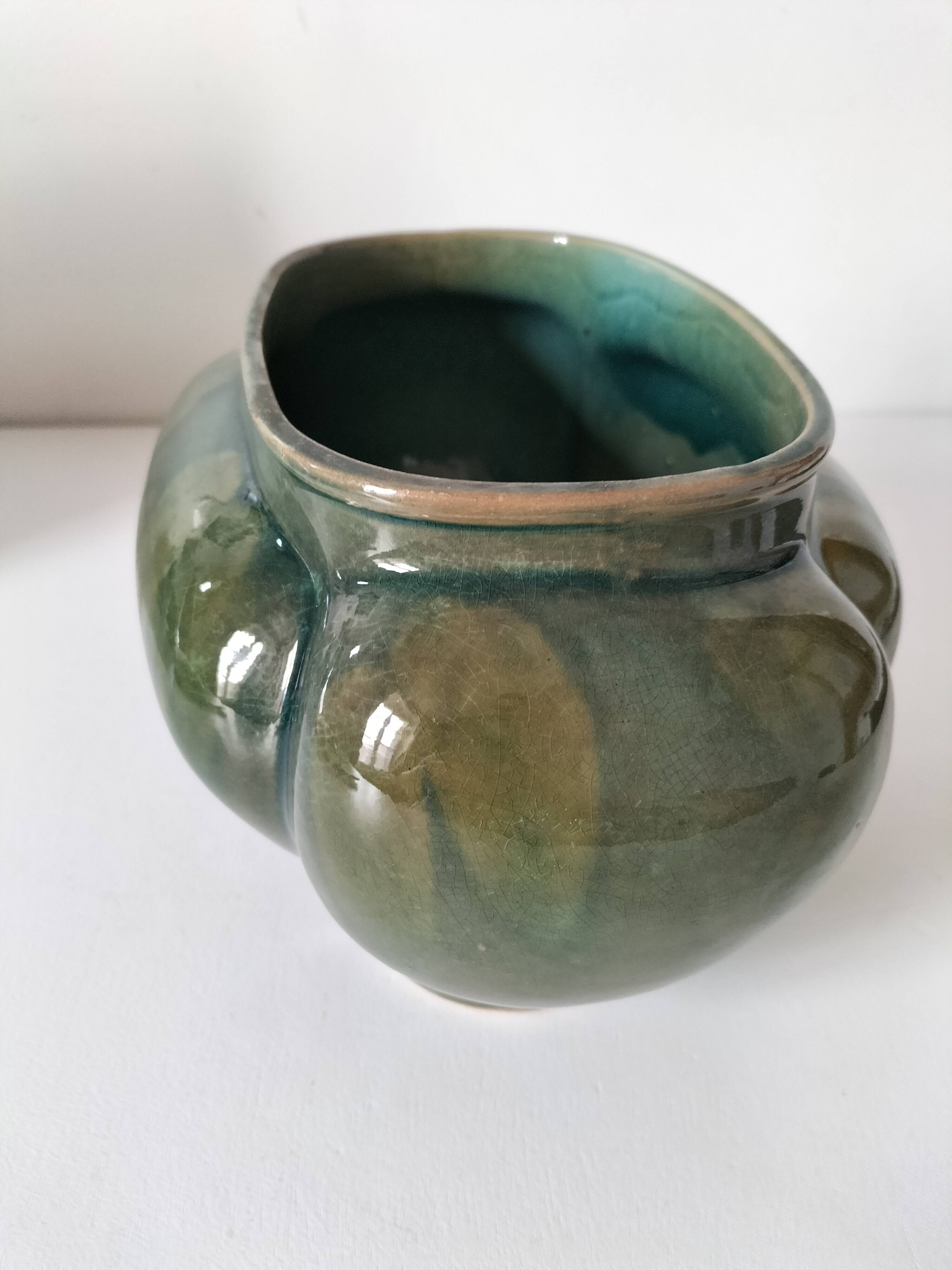 Art Deco flared cache-pot in turquoise glazed earthenware.
