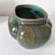 Art Deco flared cache-pot in turquoise glazed earthenware.