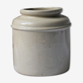 Antique ceramic pot and grey icing