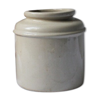 Antique ceramic pot and grey icing