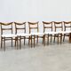 Set of six walnut Lübke dining chairs