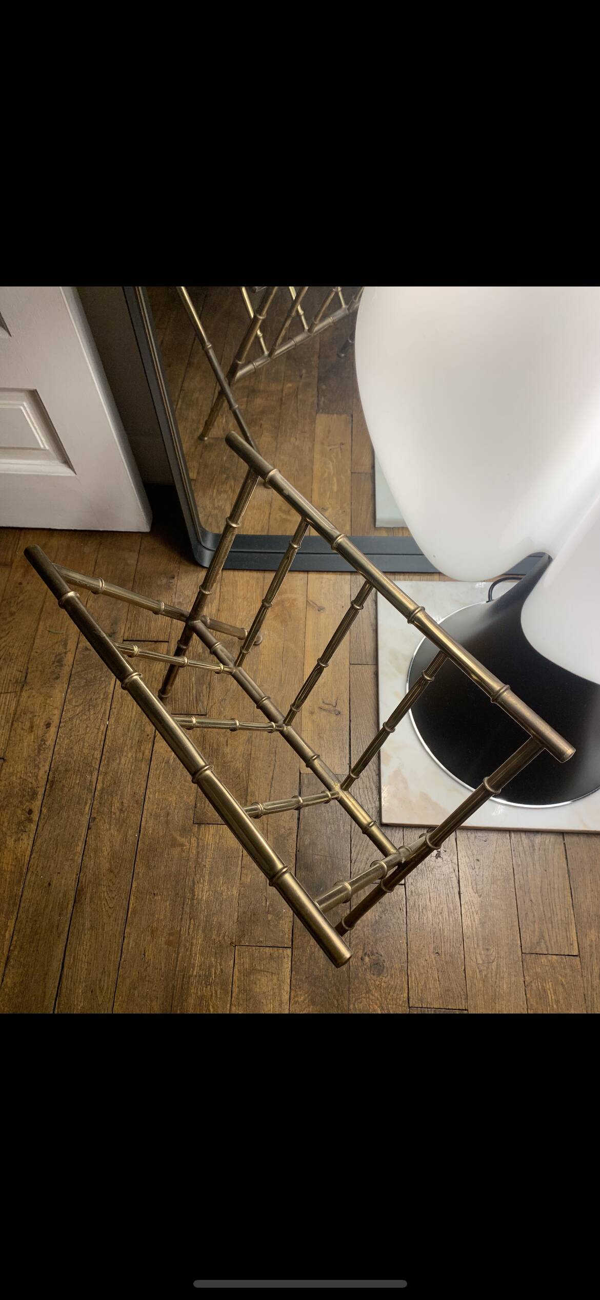 Magazine rack in the style of Jacques Adnet, bamboo model in brass.