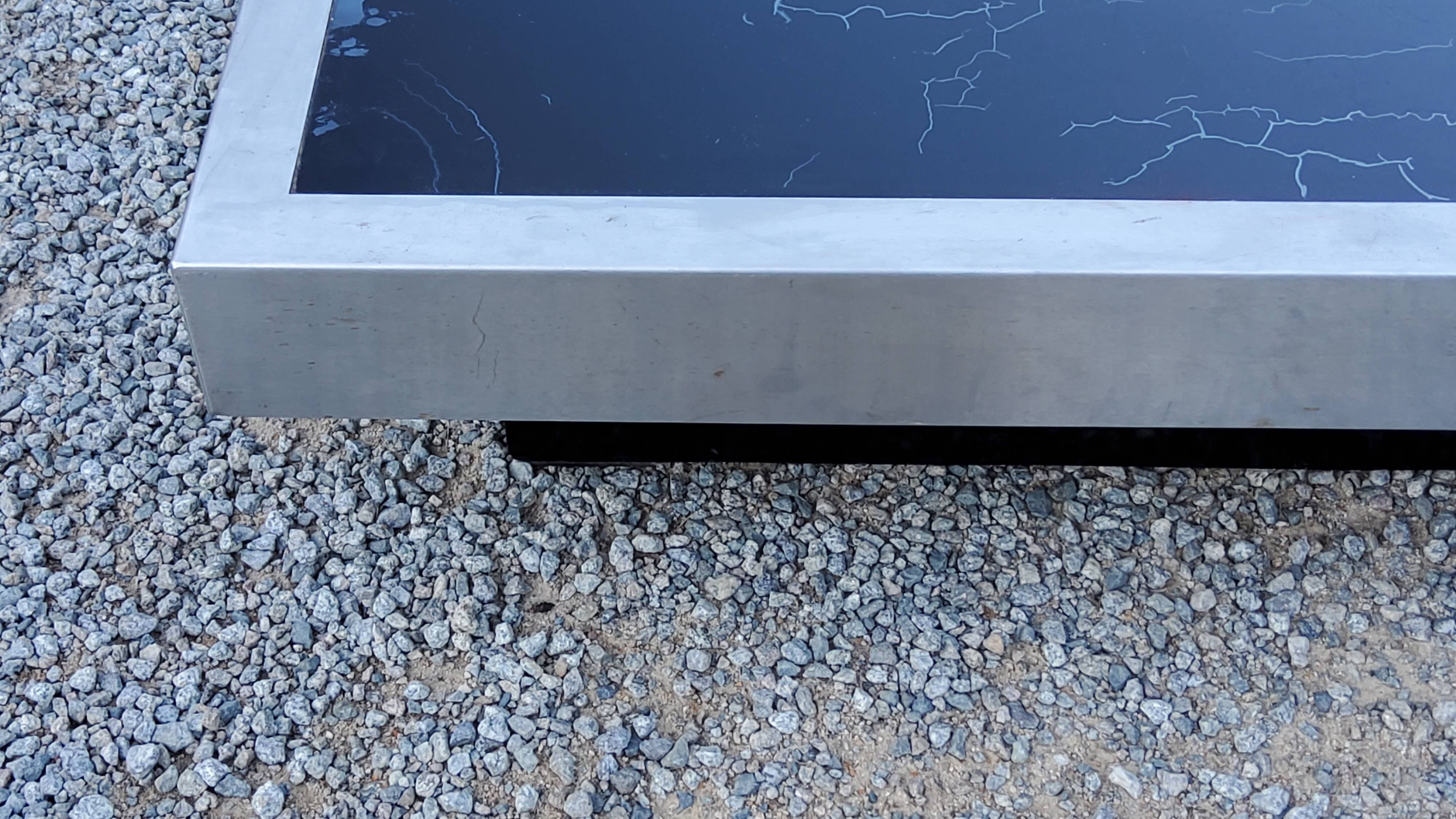 Coffee table in brushed steel and black tinted glass from the 70s
