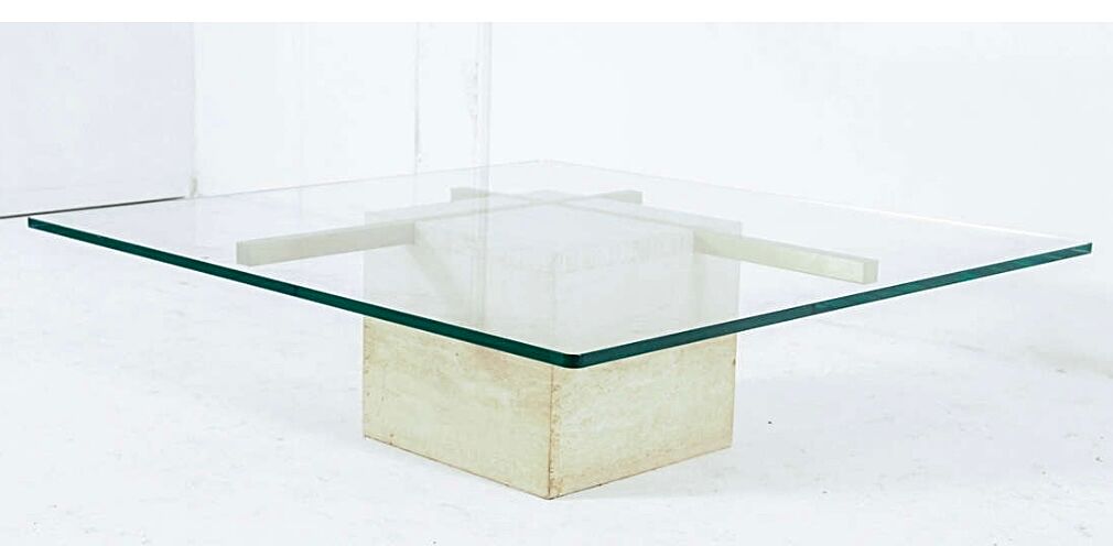 Coffee table with travertine gold-plated cross base and glass top