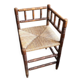 Corner chair in turned wood and straw