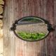 Art Deco mirror in wrought iron and beveled glass