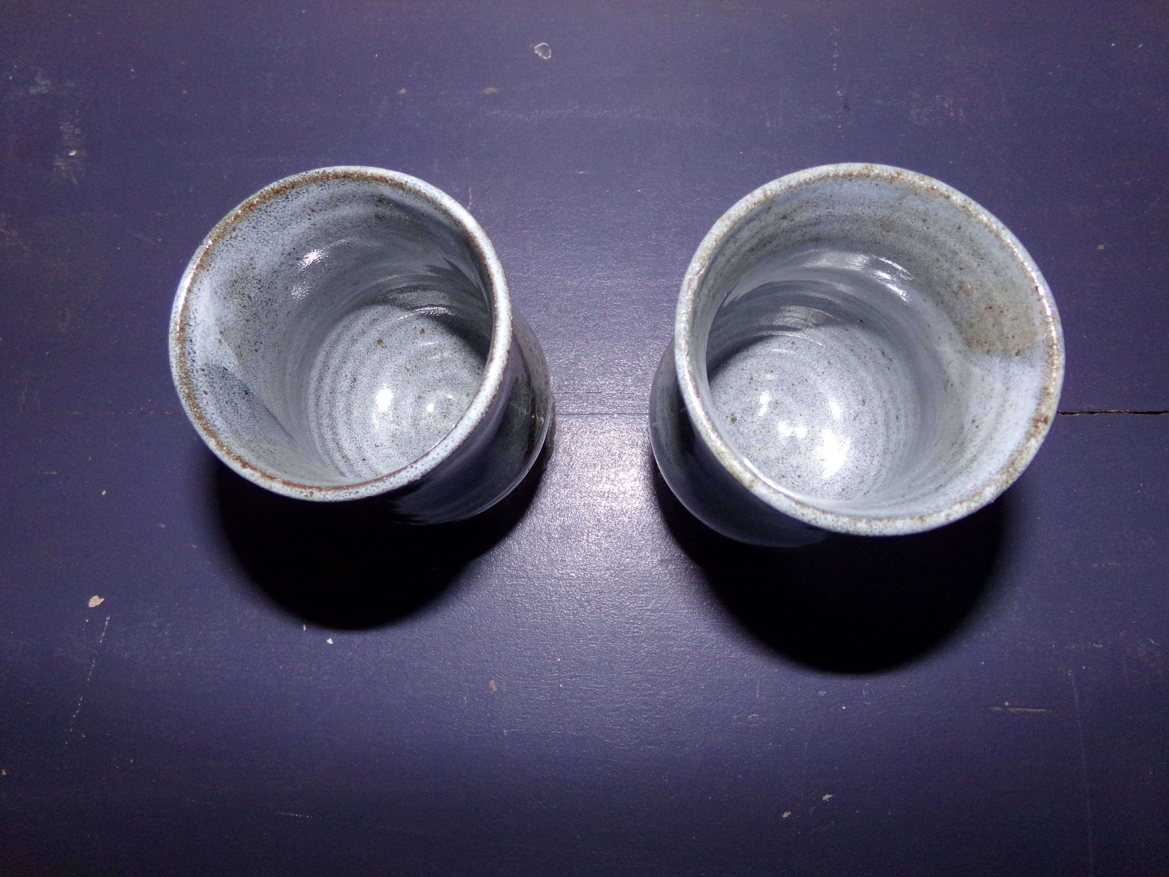 2 stoneware blue glasses