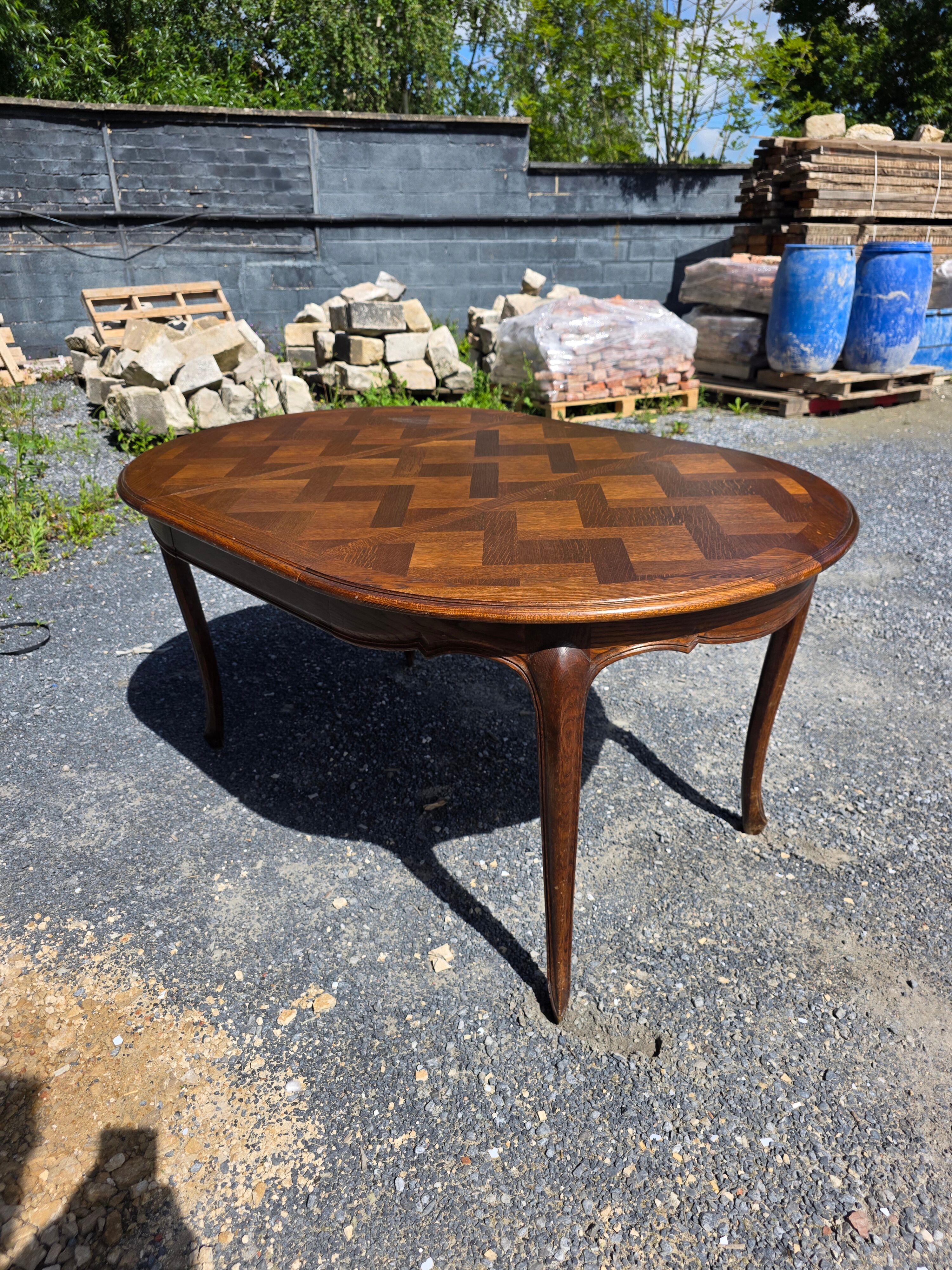 Extendable table in Louis XV style in oak (2 extensions)