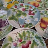 6 dessert plates in Saint Clément barbotine, hand-painted with a fruit motif.