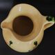 Vintage glazed terracotta ceramic jug from the 20th century.