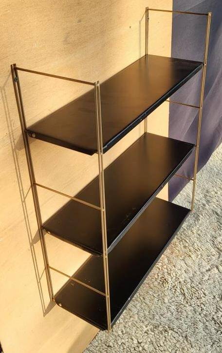 Tomado style black metal string shelf with gold ladder