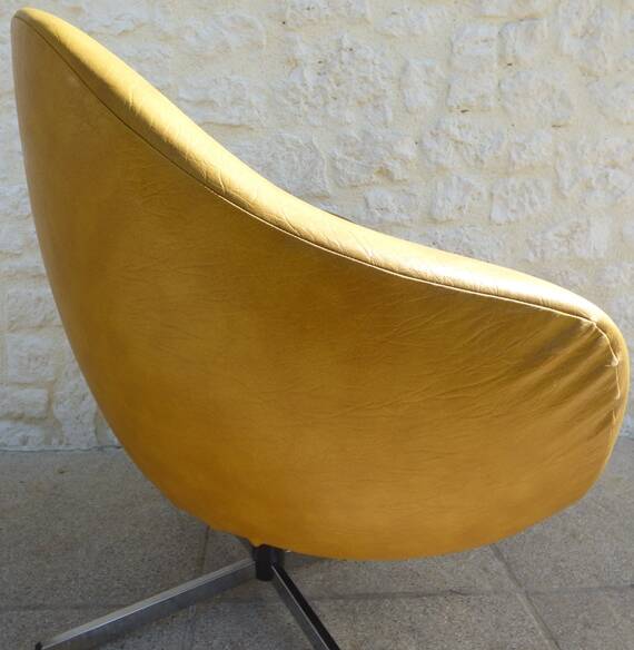 Vintage swivel armchair from the 70s in imitation leather