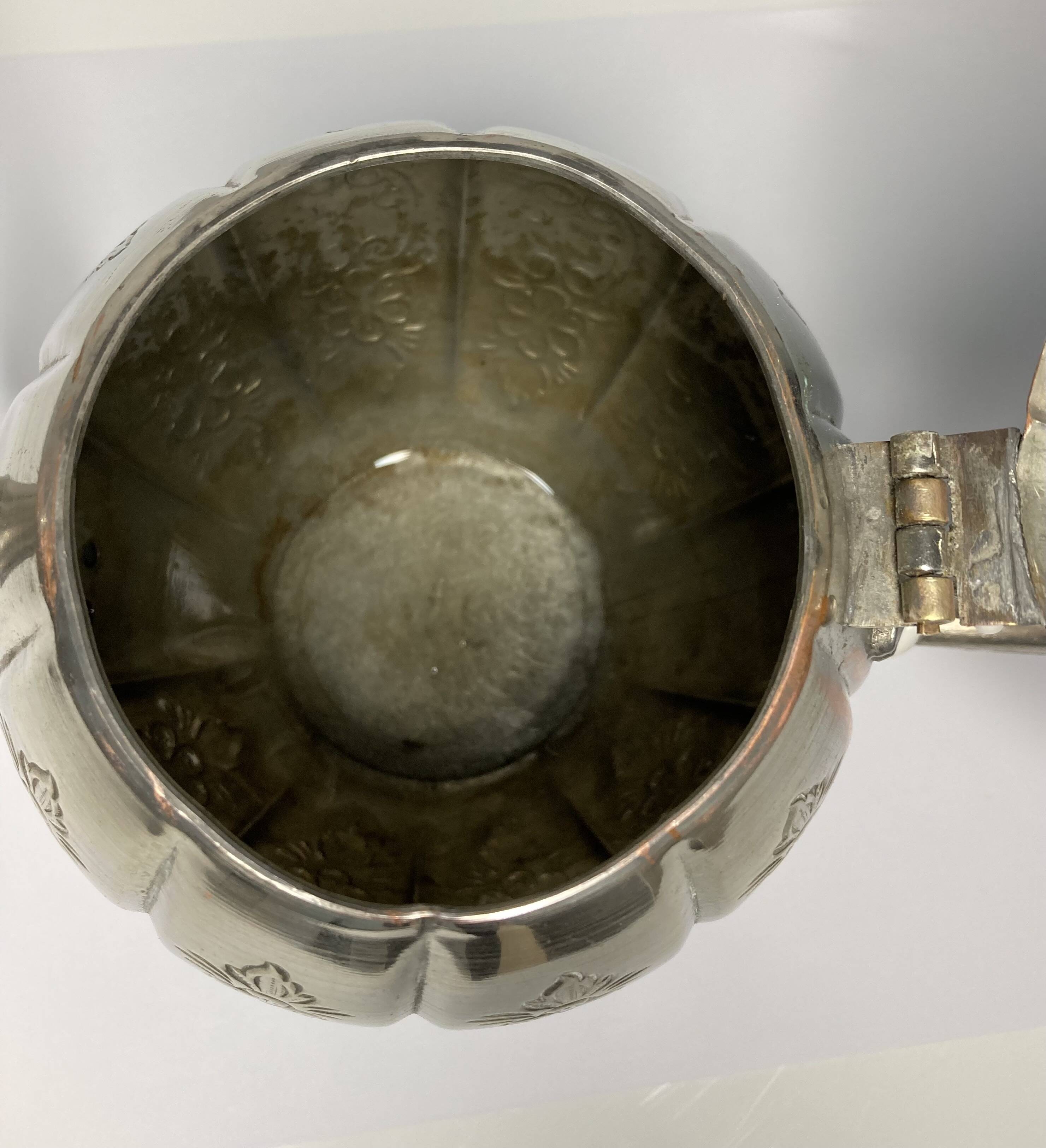 Vintage silver metal teapot from the 1930s