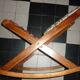 Rests wooden feet and folding tapestry