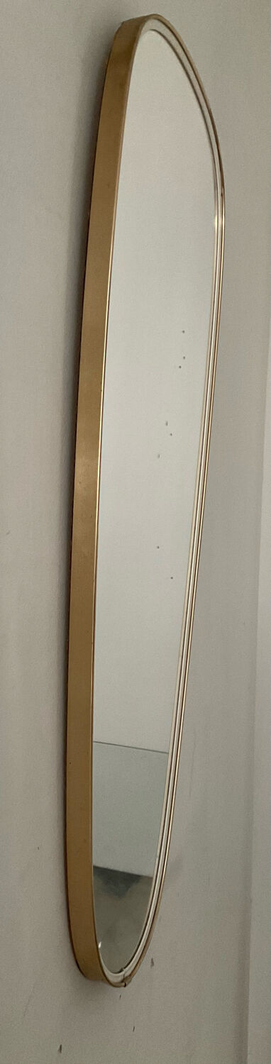 Asymmetrical free-form mirror from the 60s