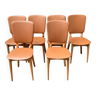Six chairs in brown plastic and vintage wood