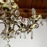 Chandelier with a floral porcelain decoration and pendants