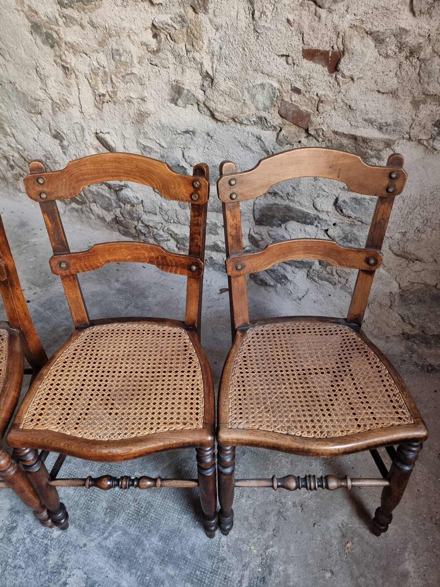 Set of 4 antique dining chairs with caned seats, beech, France, circa 1900–1920.