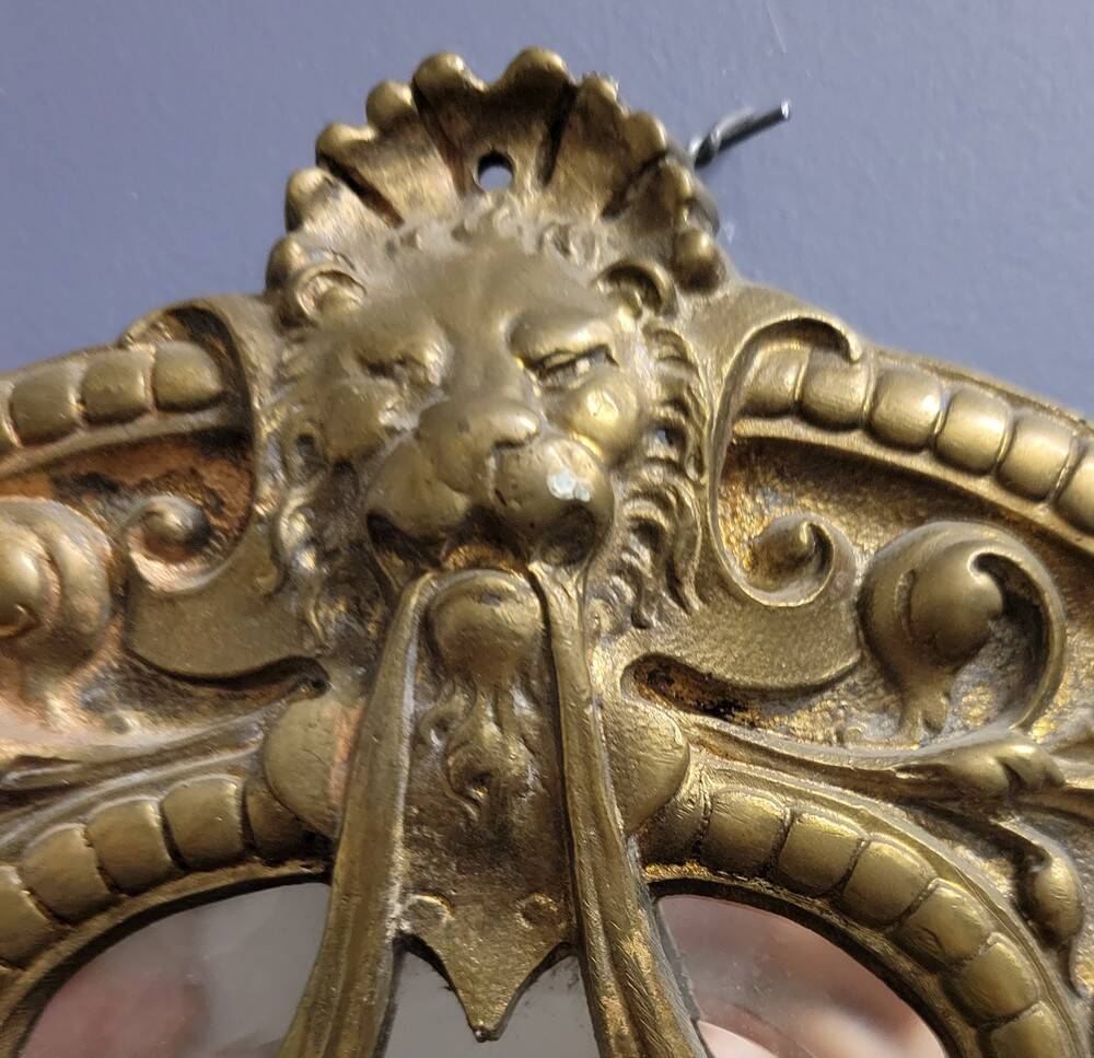 Pair of bronze mirror sconces