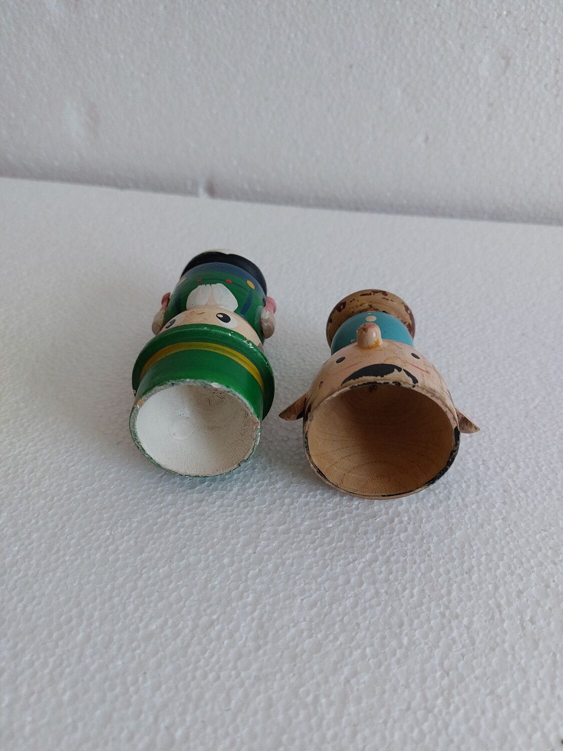 Duo of wooden cockroaches, characters