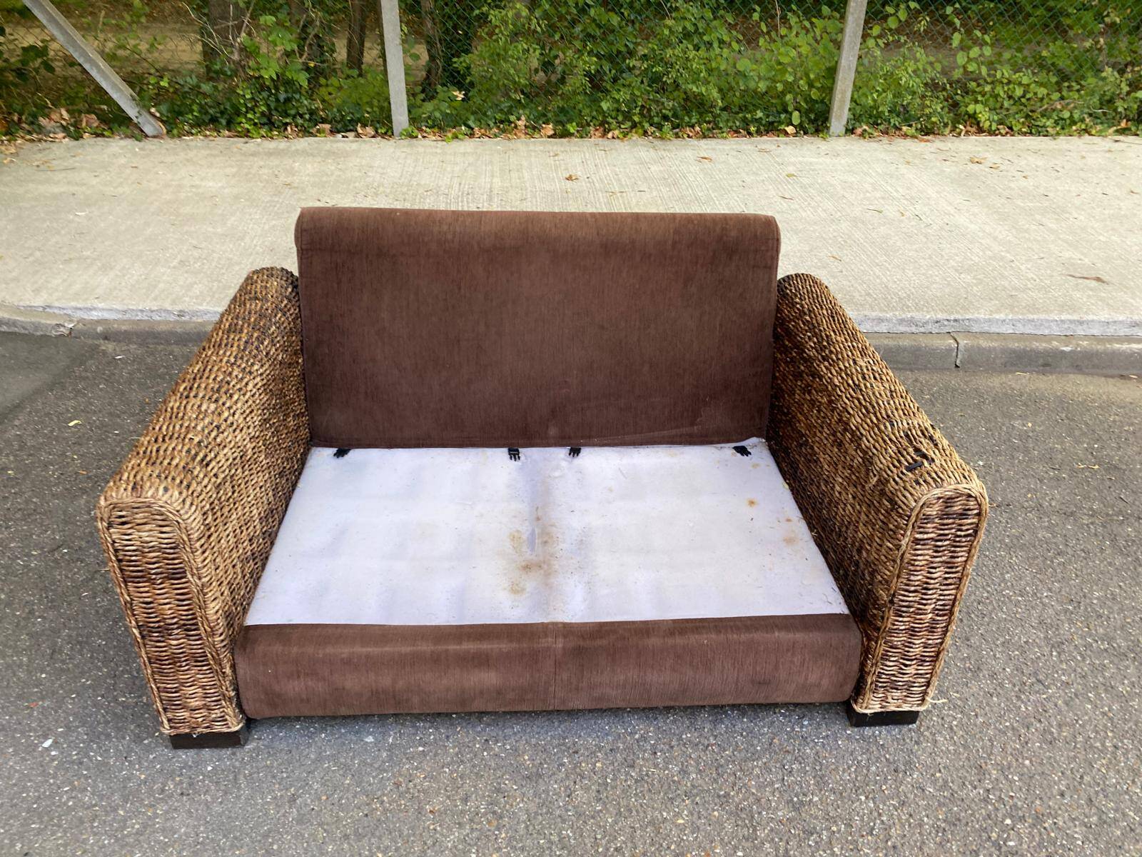 Exotic 2-seater sofa in woven banana tree / rattan and brown fabric.