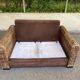 Exotic 2-seater sofa in woven banana tree / rattan and brown fabric.