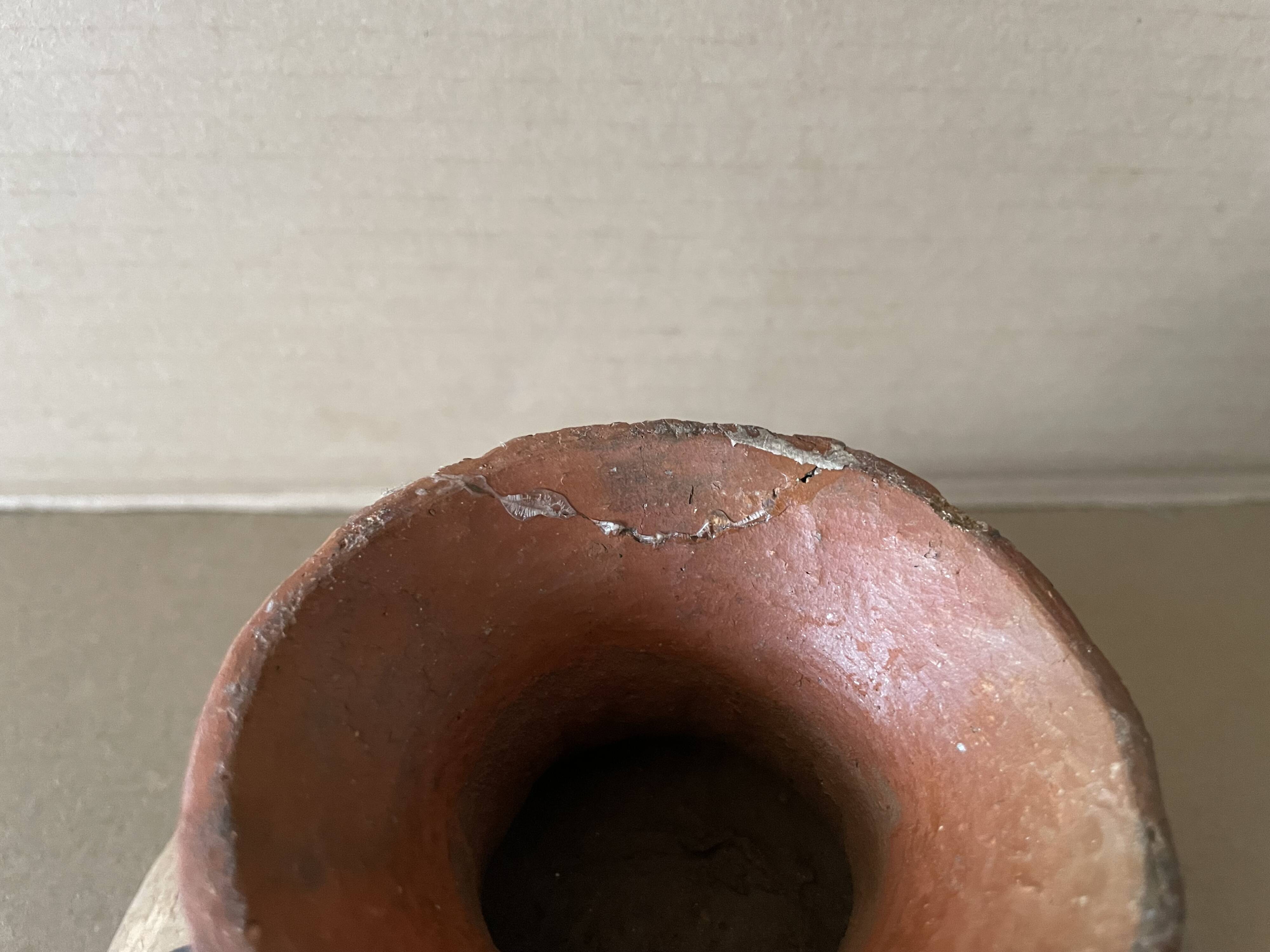 Antique terracotta cup