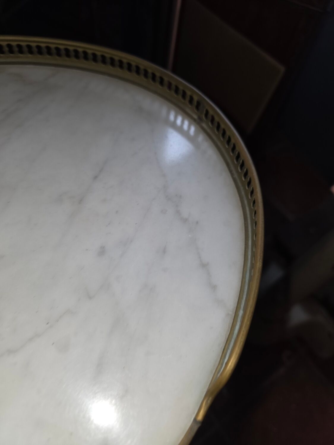 Pair of Louis XVI style bedside tables in mahogany, with marble tops.
