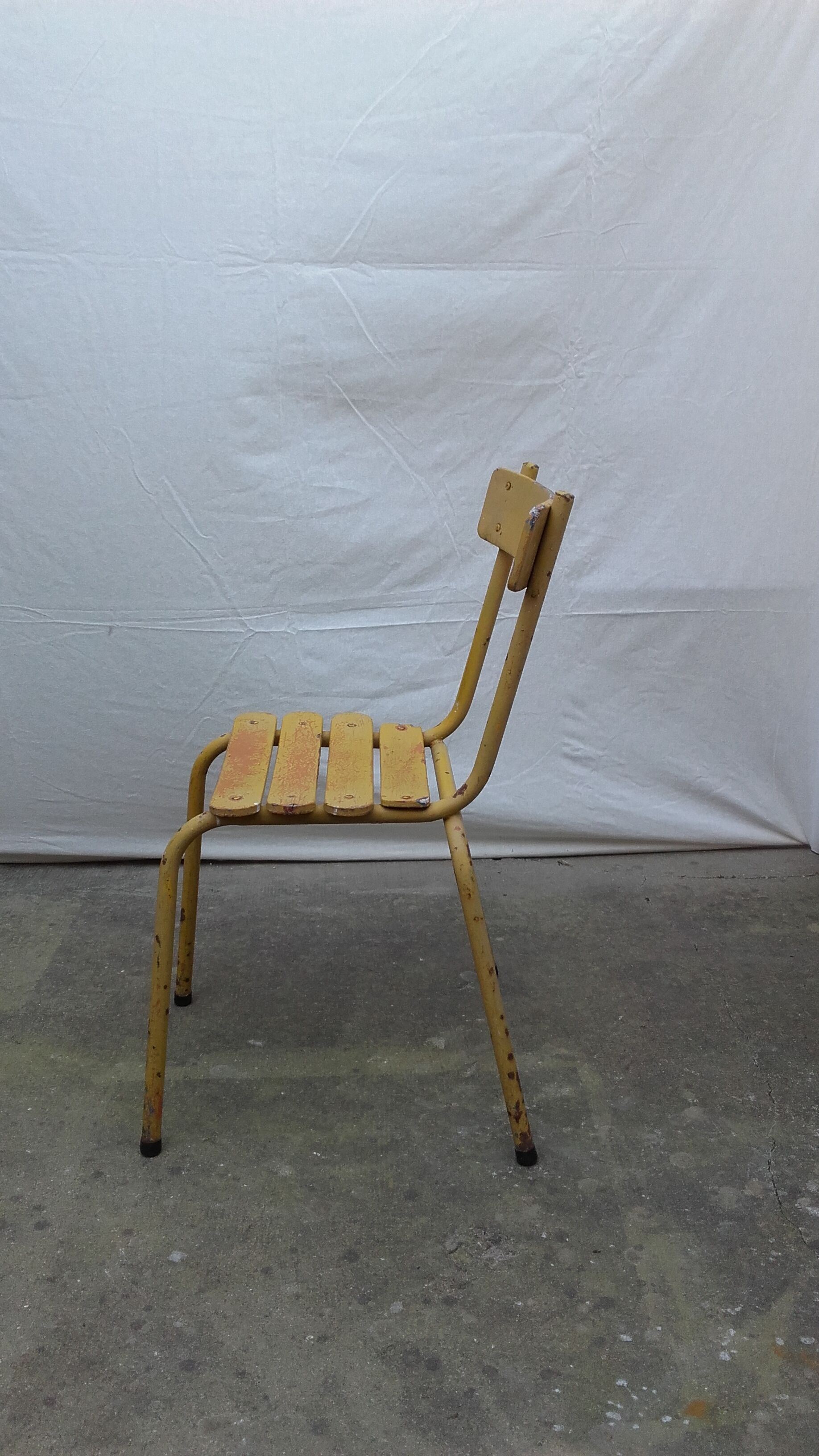 Three wooden and metal bistro chairs