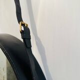 Jacques Adnet pair of circular leather and brass mirrors