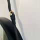 Jacques Adnet pair of circular leather and brass mirrors