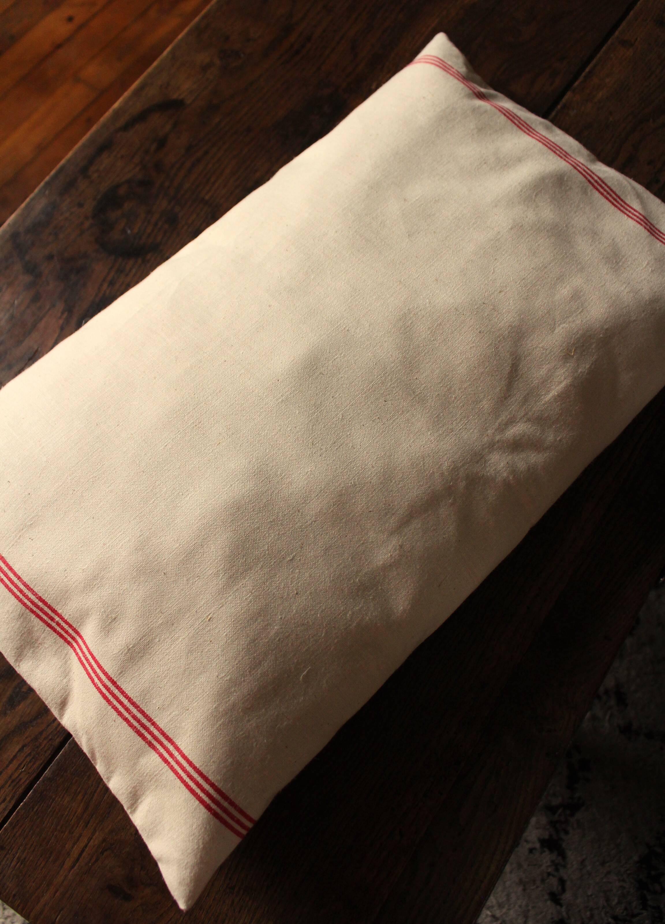 Old red striped Torchon cushion