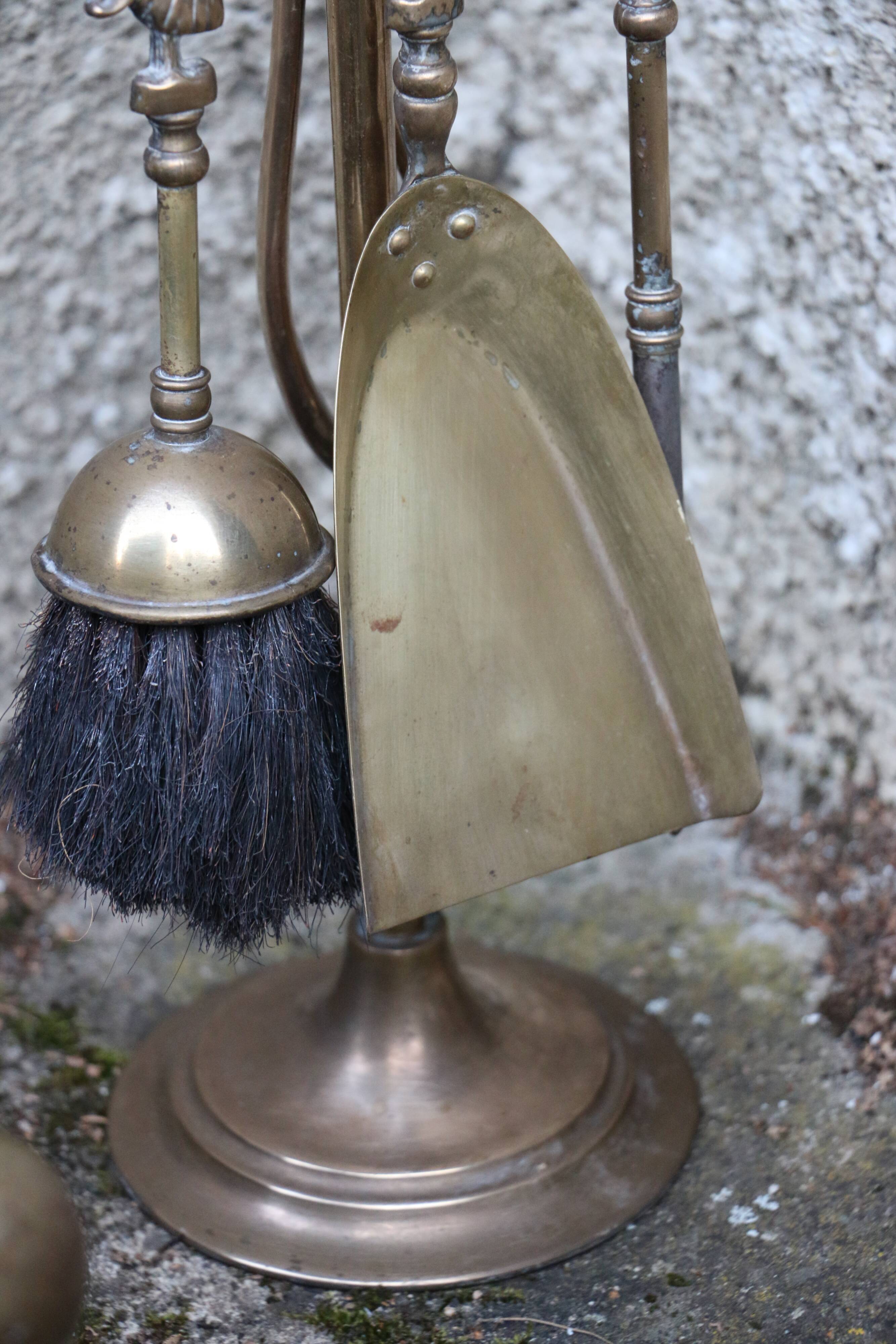 Brass fireplace servant with pair of cast iron pegs with vintage brass ball year 60