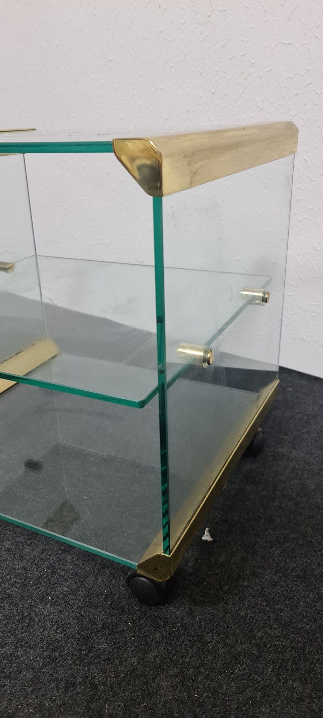 Vintage glass sidetable on wheels