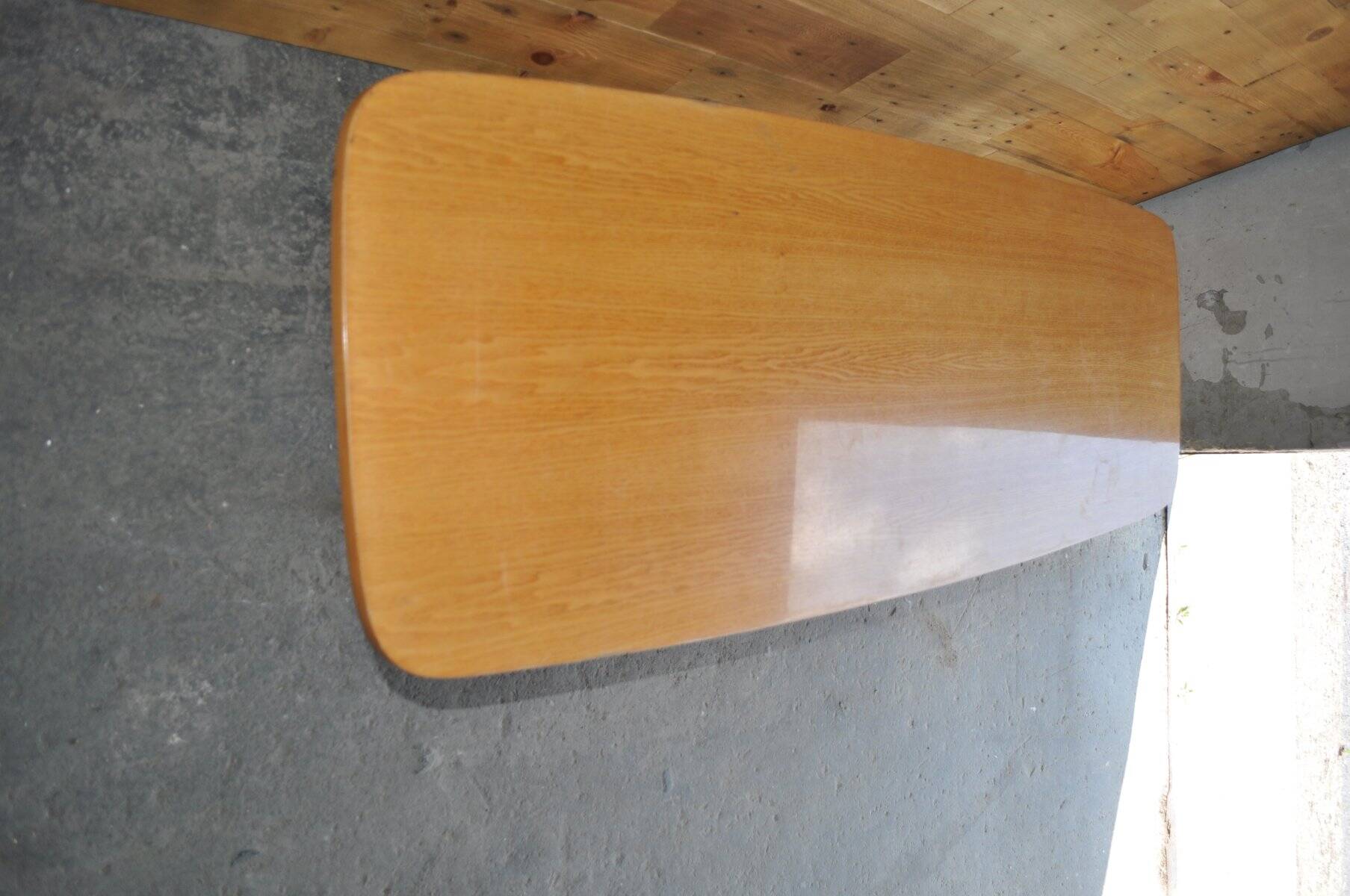 Vintage coffee table in maple and brown beech, surfboard style, with integrated magazine rack.