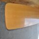 Vintage coffee table in maple and brown beech, surfboard style, with integrated magazine rack.