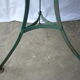 Old riveted metal garden pedestal