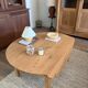 Round folding coffee table in solid wood