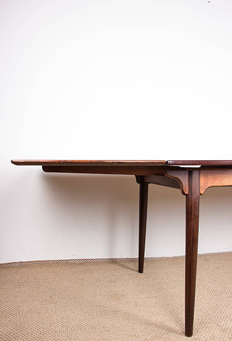Danish extendable dining table in rosewood, model 54 by Gunni Omann